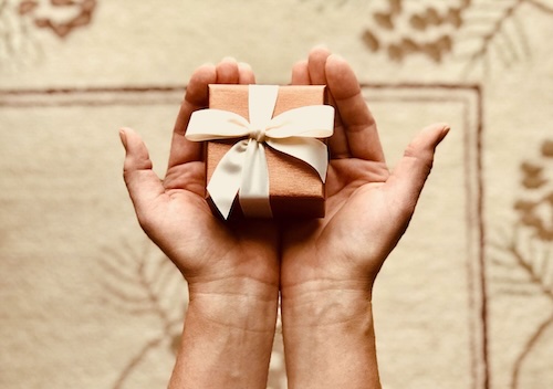 small gift in hands