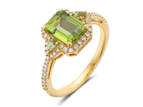 gold ring with green emerald gemstone